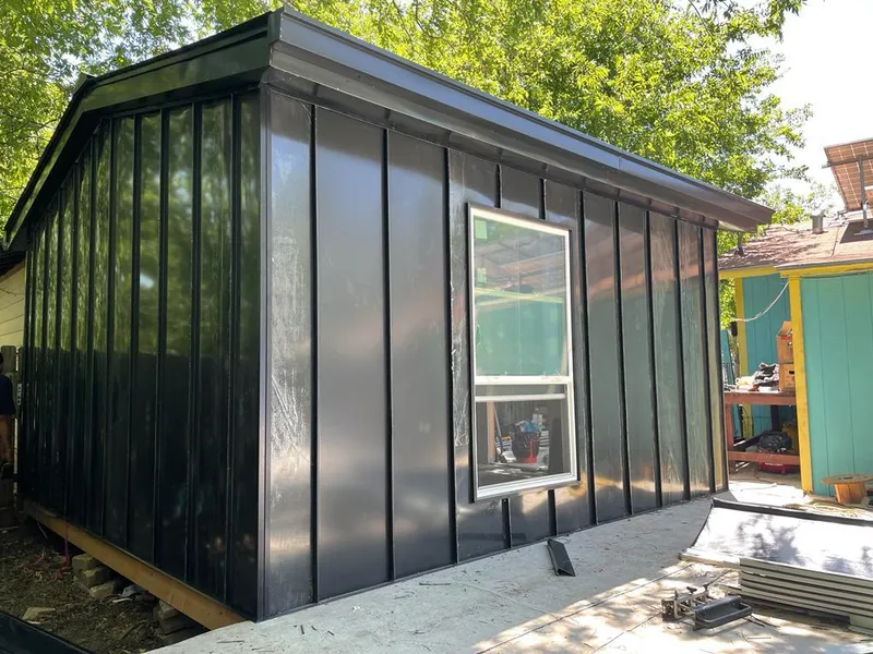 Black standing seam metal wall panels for Roof Inspection in Poway