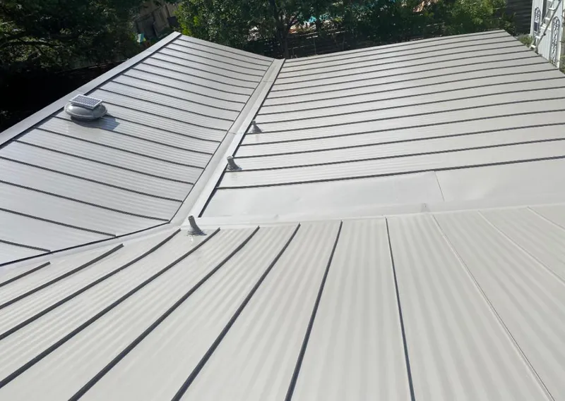 Solar attic fan installed on a metal roof for Roof Ventilation in Poway